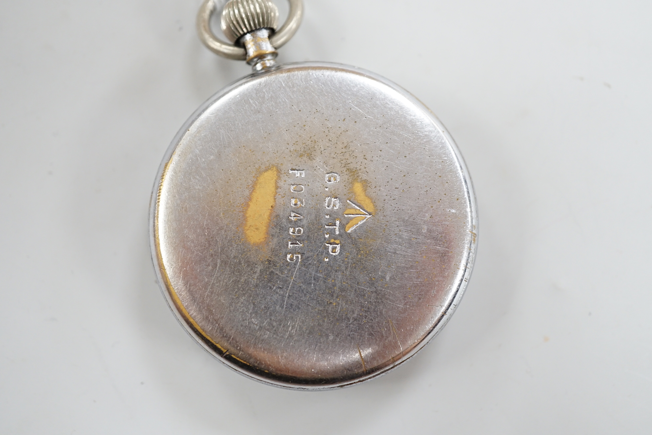 A nickel cased Jaeger LeCoultre military issue pocket watch, with Arabic dial and subsidiary seconds, the case back numbered G.S.T..P below broad arrow F034915.